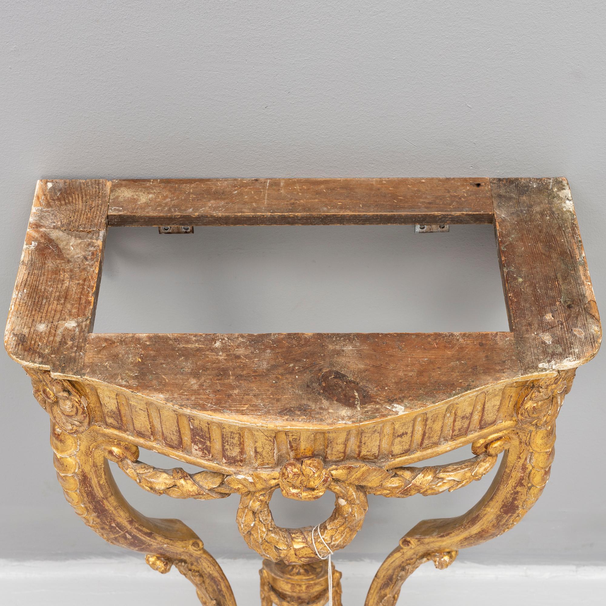 A presumably Danish Louis XVI giltwood and marble console table, late 18th century.