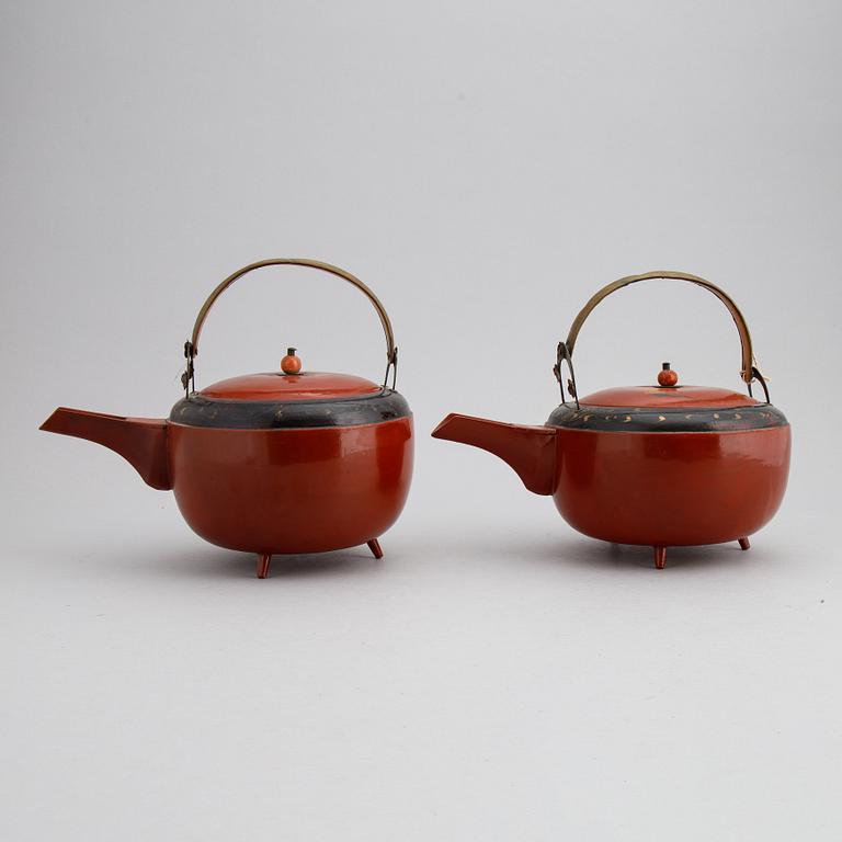 A pair of Japanese red lacquer pots, presumably Meiji (1868-1912).