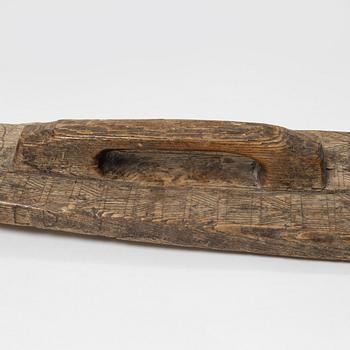 A Swedish folk art mangle board, dated 1666.