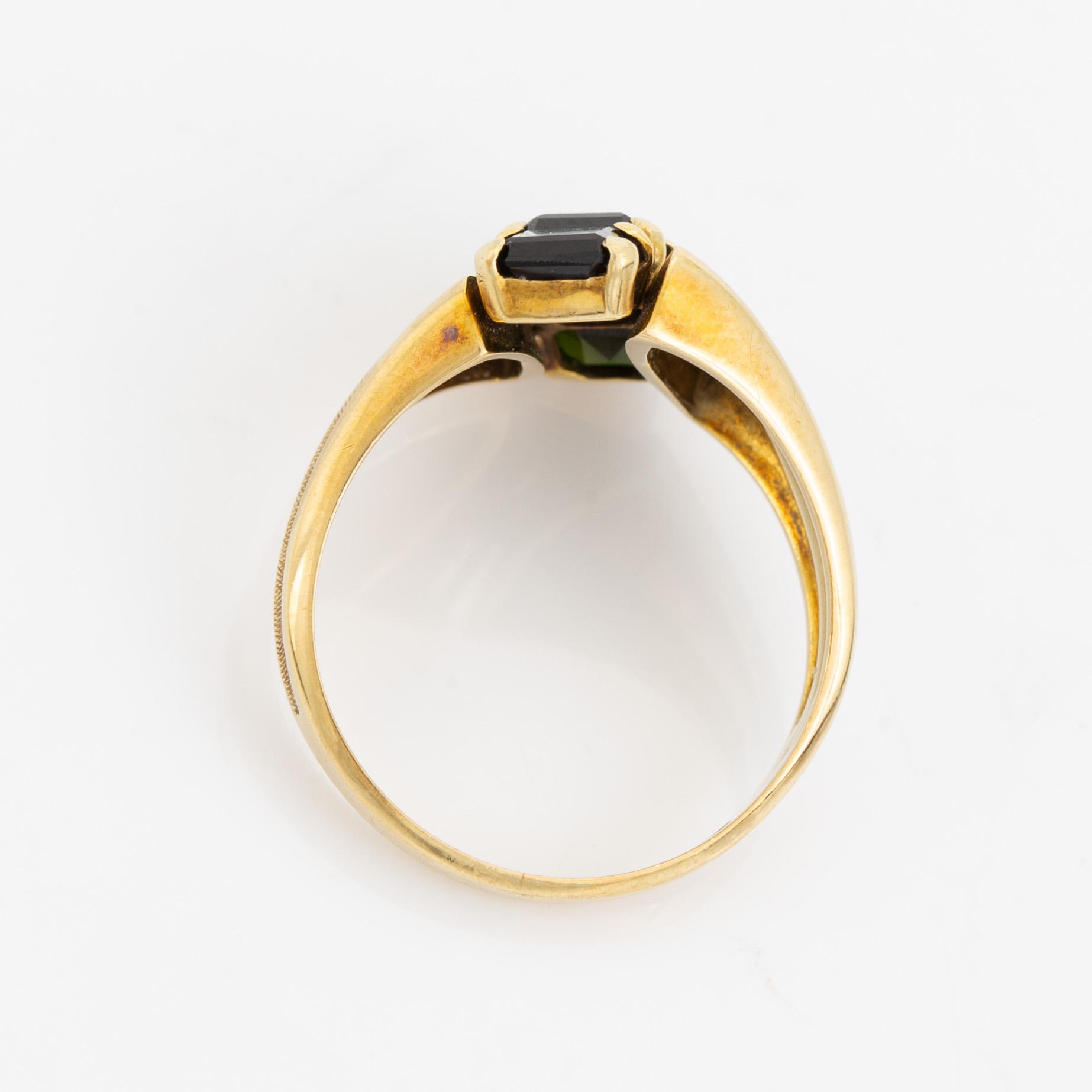 14K gold and green torumaline ring.