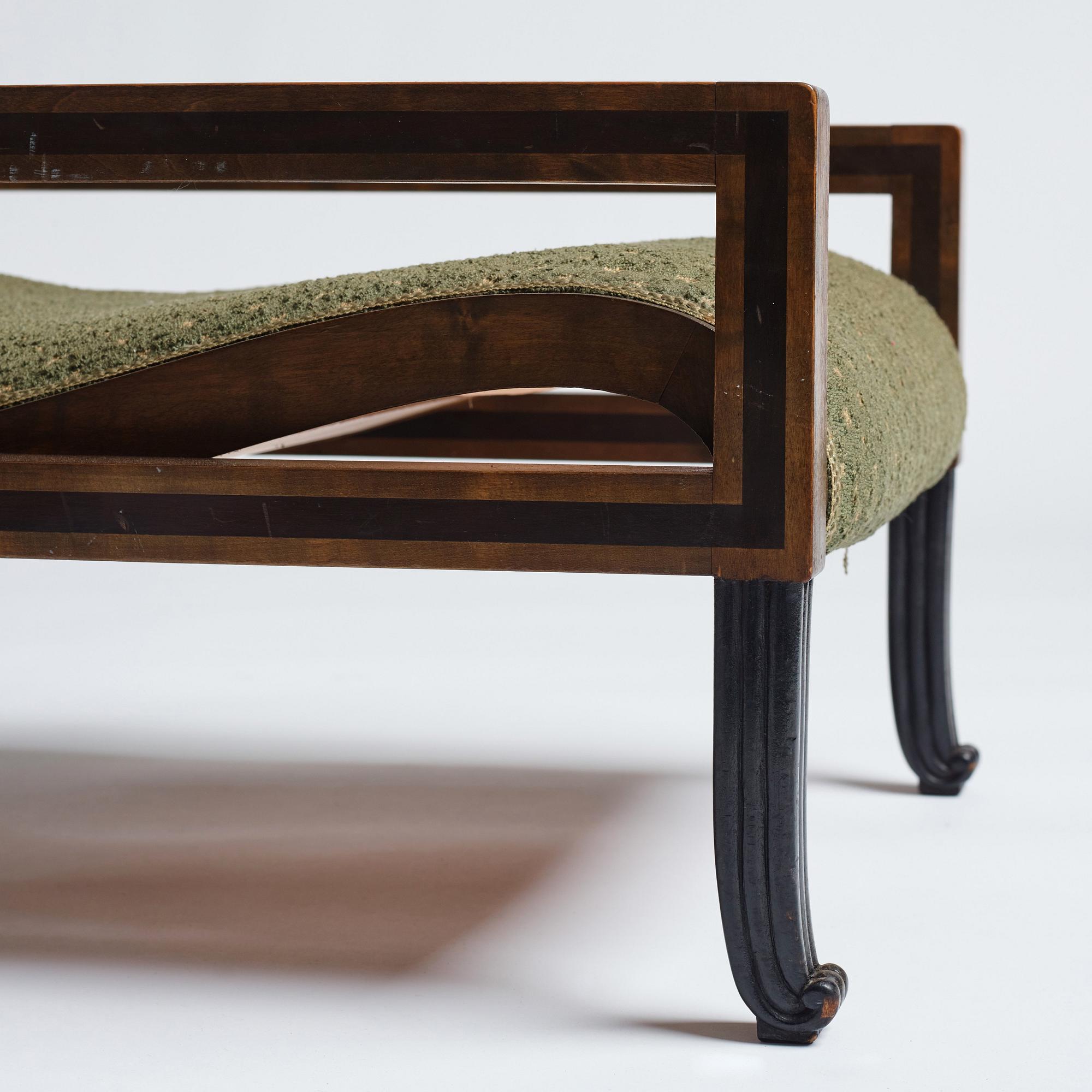 Carl Hörvik, a pair of mahogany-stained birch lounge chairs, Swedish Grace 1920s.