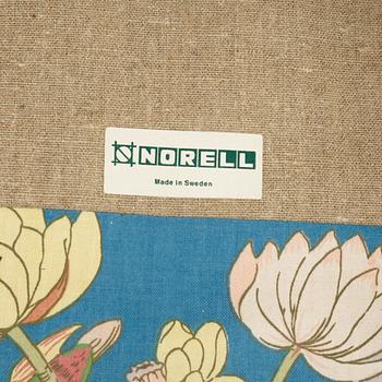 A Swedish armchair and stool, Norell Möbel, late 20th century.