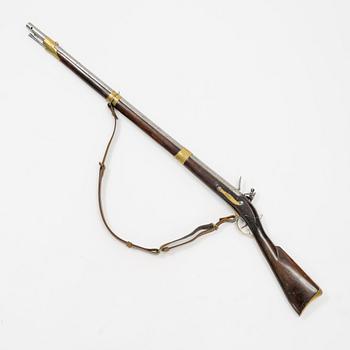 A Swedish flintlock rifle with Brtitish lock.