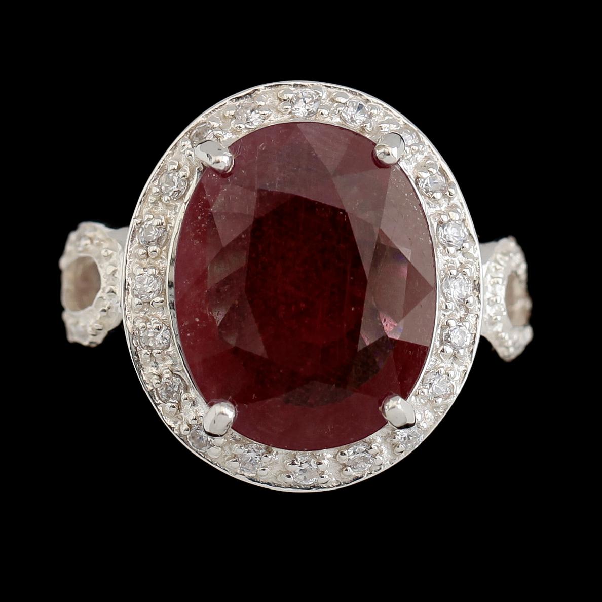 RING, vitguldspläterat sterlingsilver, rosa safir ca 12.00 ct, vita safirer tot ca 0.54 ct.