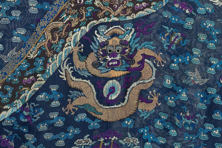A blue ground summer gauze 'dragon robe' robe, Qing dynasty, circa 1900.