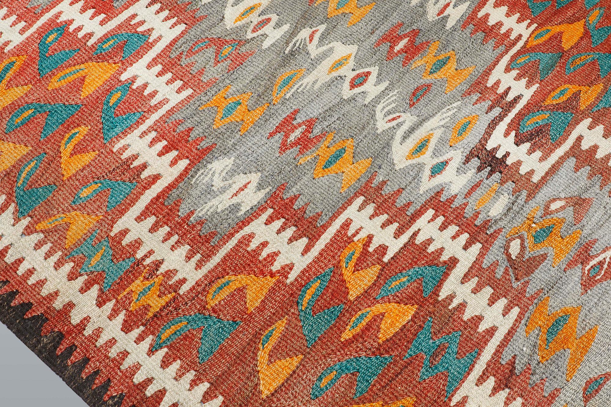 A Nomad Kilim rug, approx. 255 x 150 cm.