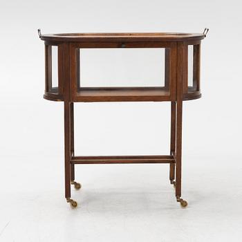 An oak tea trolley, early 20th Century.