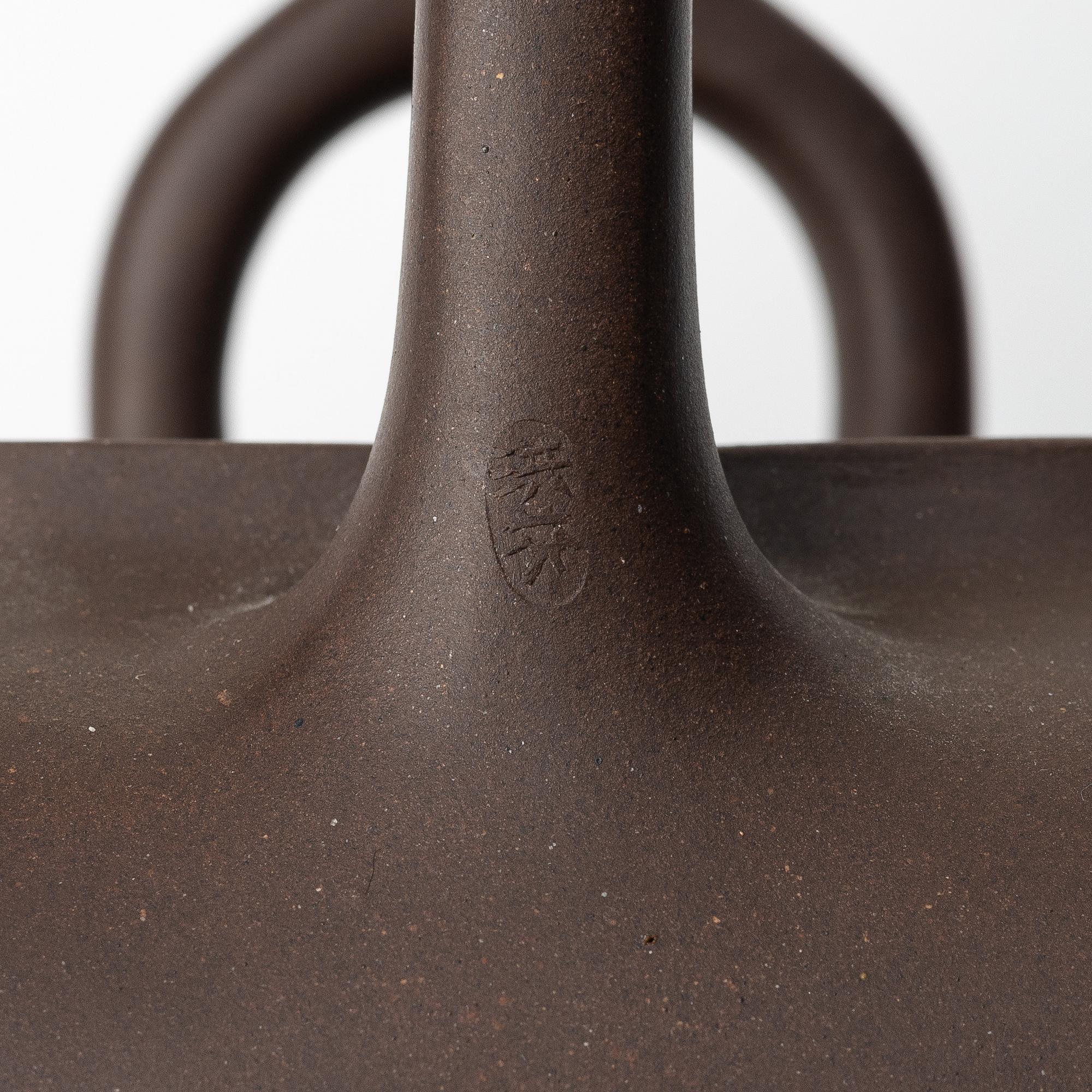 Wang Hongfen, A nrown yixing teapot, 1980s.