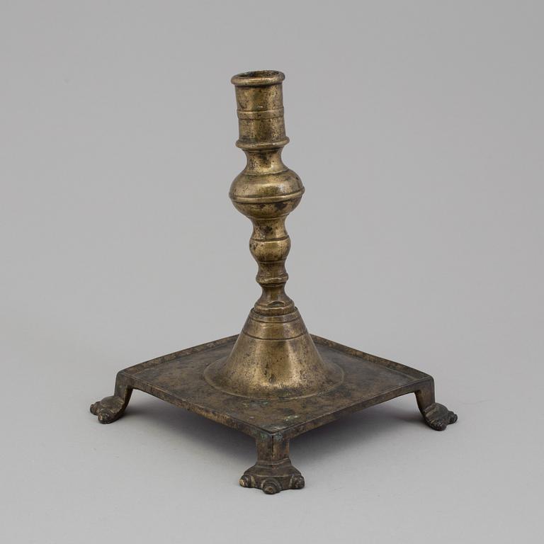 A BRONZE  CANDLESTICK, 17th century.