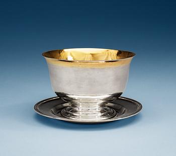 901. A Swedish 19th century parcel-gilt sauce-bowl, makers mark of Isaac Sandbeck, Stockholm 1819.