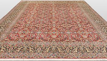 A Kirman lavar carpet, 403 x 304 cm.