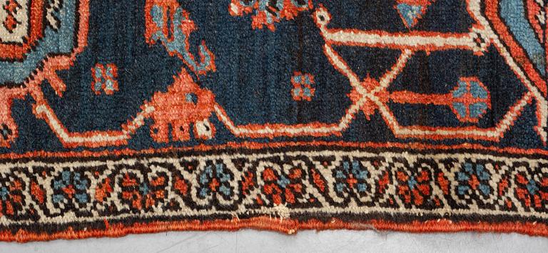 A carpet, an antique Heriz, ca 469,5-471 x 300-309,5 cm.