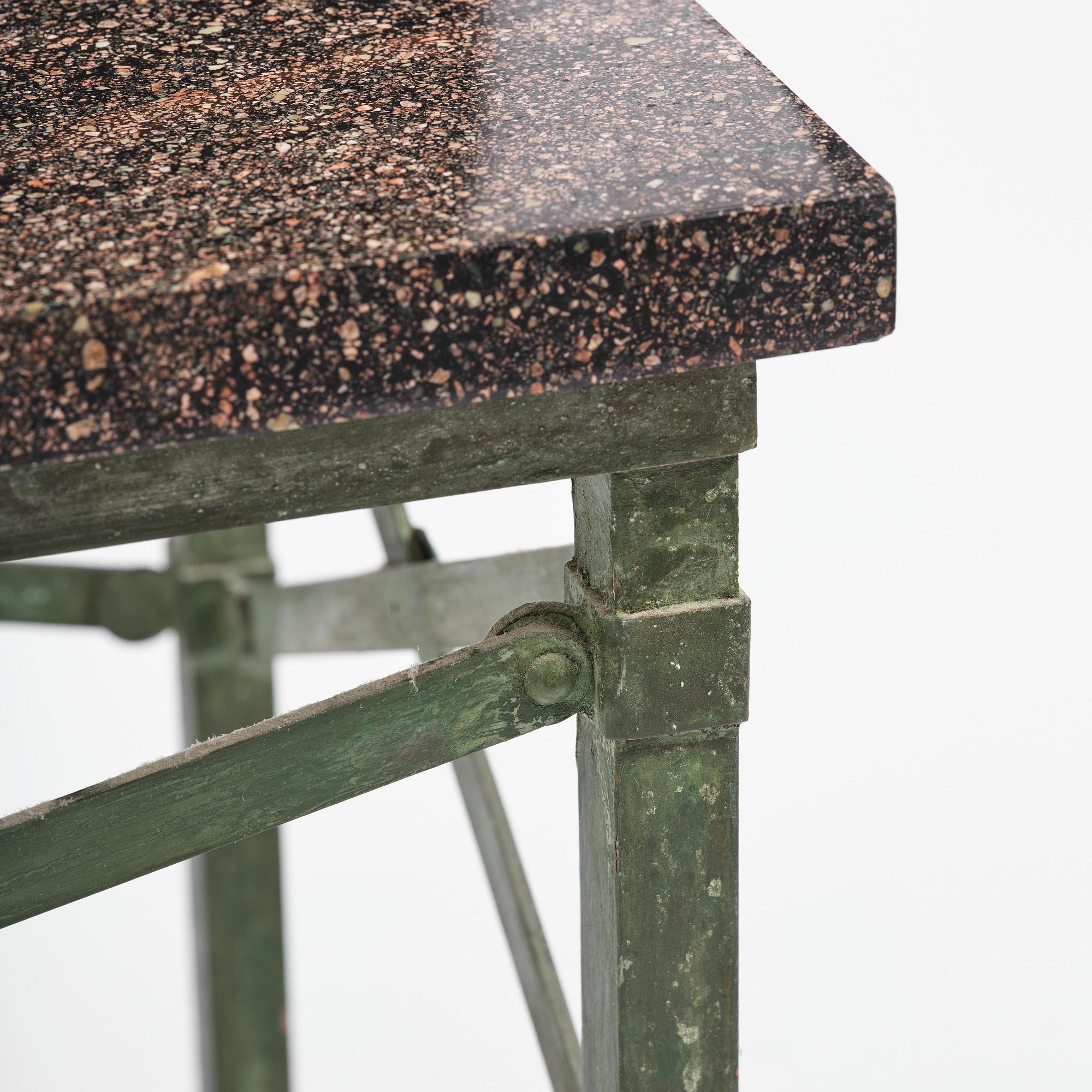 A table with Swedish 'Orrlok' porhyry top, early 19th century on a later bronze stand.