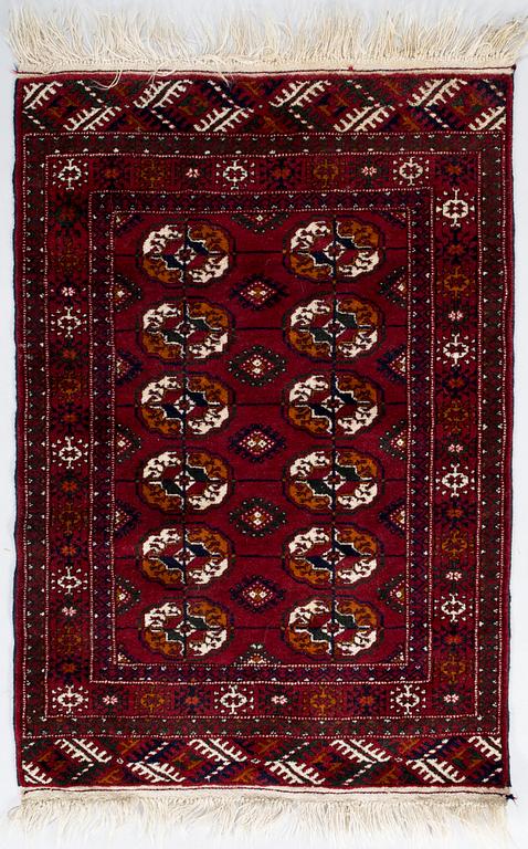 Three Afghan rugs. Ca 170x123 cm, 115x80 cm, and 117x57 cm.