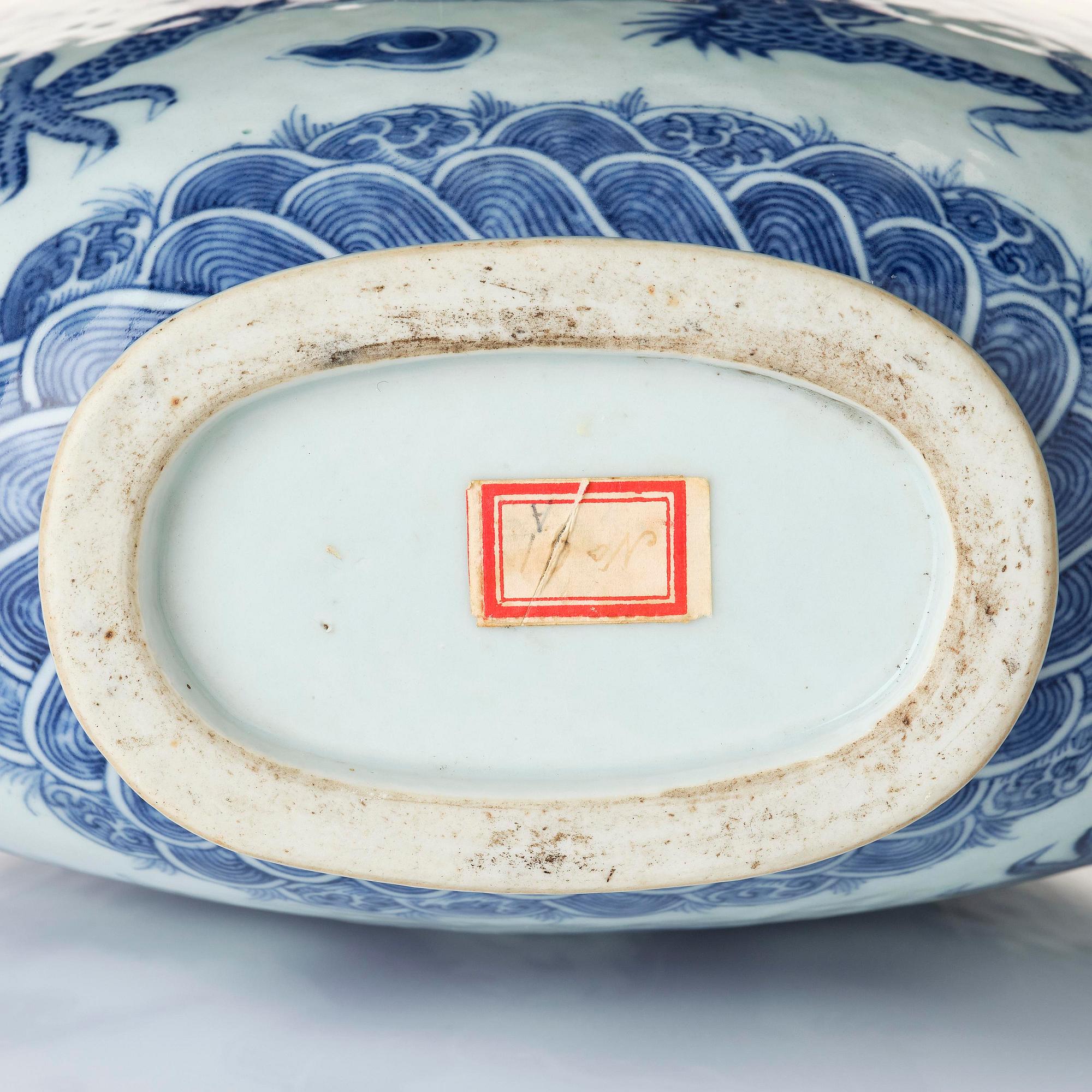 A blue and white 'dragon' moon flask, bianhu, Qing dynasty, 19th century.