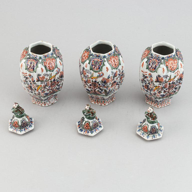 A five piece french faience garniture.