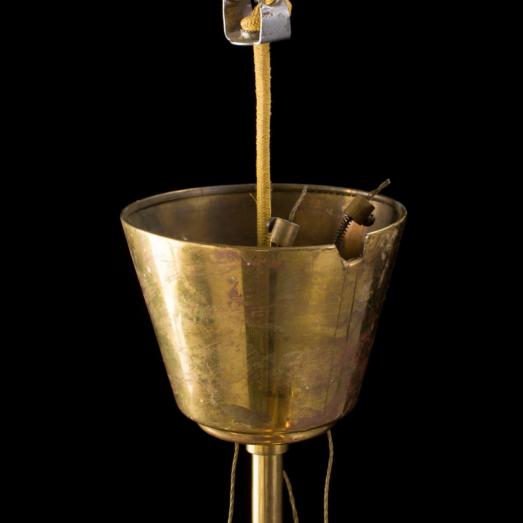 A Carl-Axel Acking Swedish Modern brass ceiling light, 1940's.