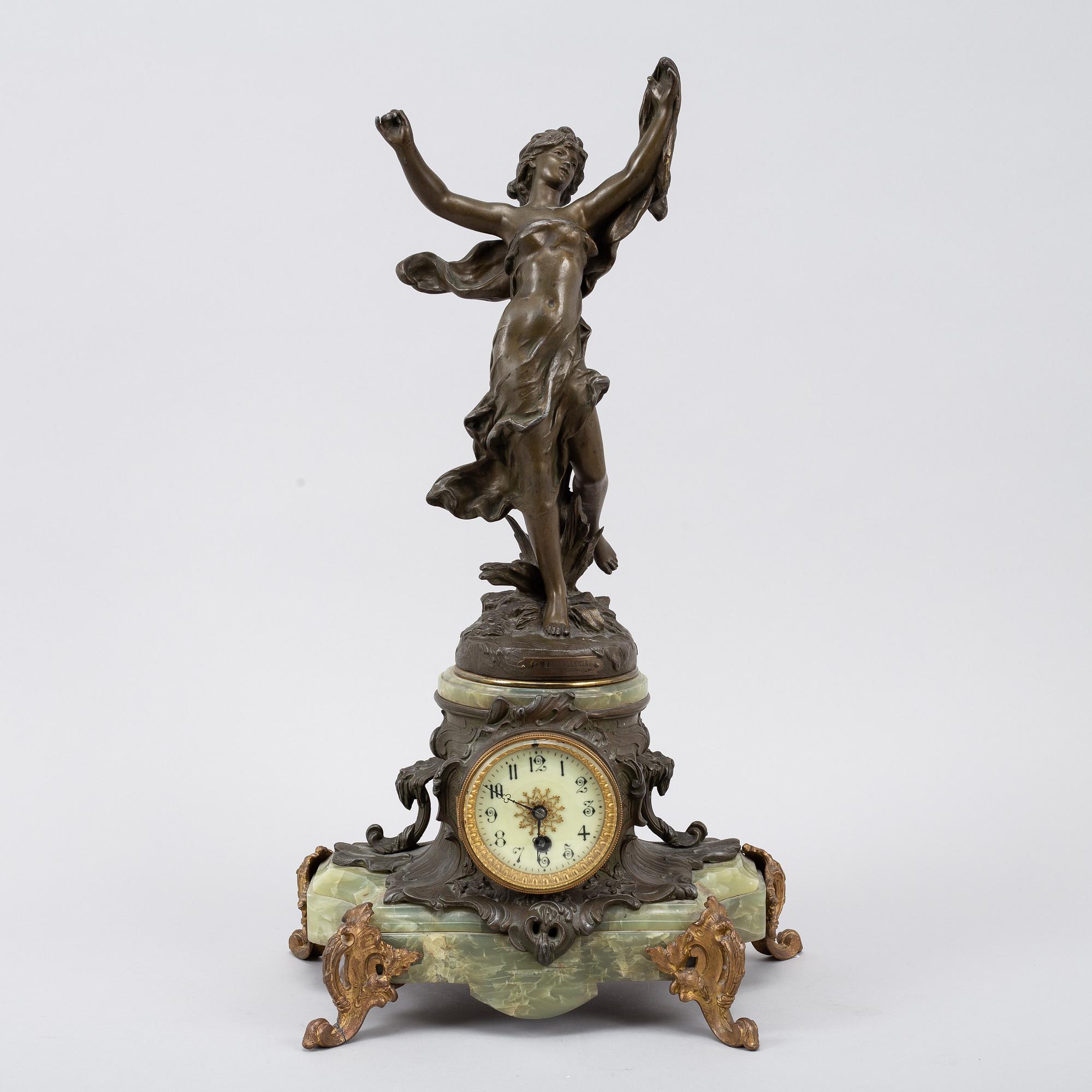 A bronze, green stone table clock, 'La Merveilleuse', after Auguste Moreau, 20th century.