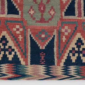 A CARRIAGE CUSHION, "Träd och timglas", double interlocked tapestry, ca 101,5 x 50,5 cm, Scania, Sweden,