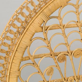 A 20th century wicker chair.