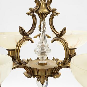 A glass and brass ceiling light, first half of the 20th Century.