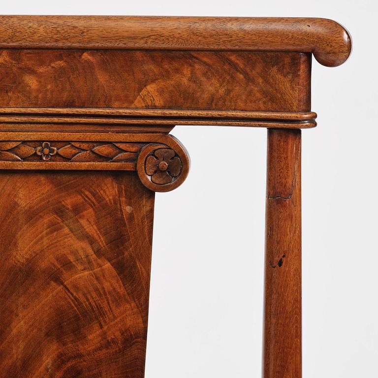 A set of nine Charles X mahogny dining chairs.