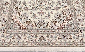 A Nain part silk carpet, 244 x 156 cm.