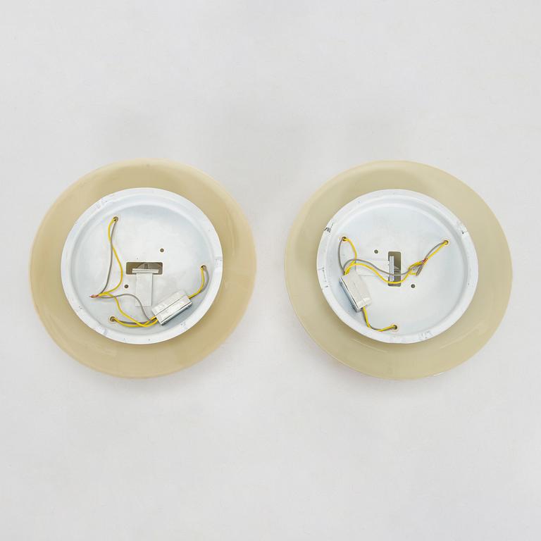 A pair of mid-20th century 'EA 72 ceiling lights for Itsu.