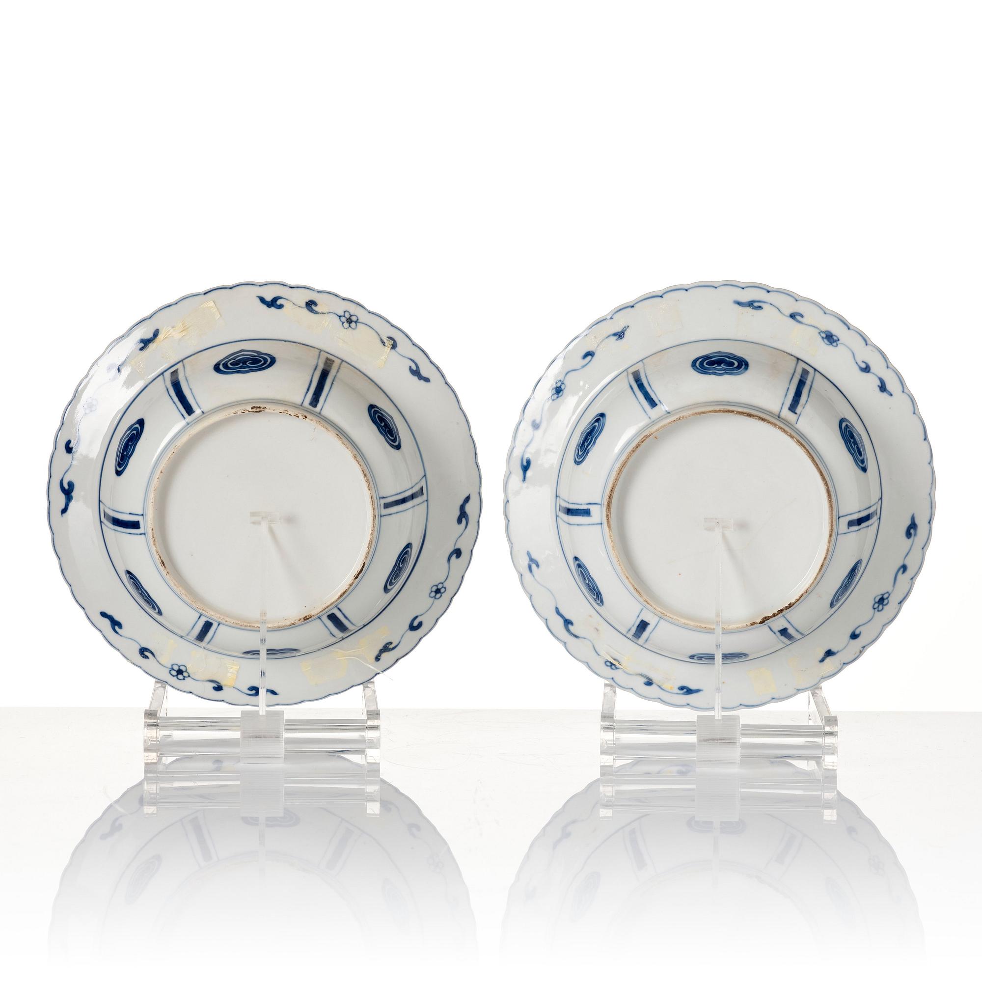 A pair of blue and white Kangxi style dishes, 19th Century.