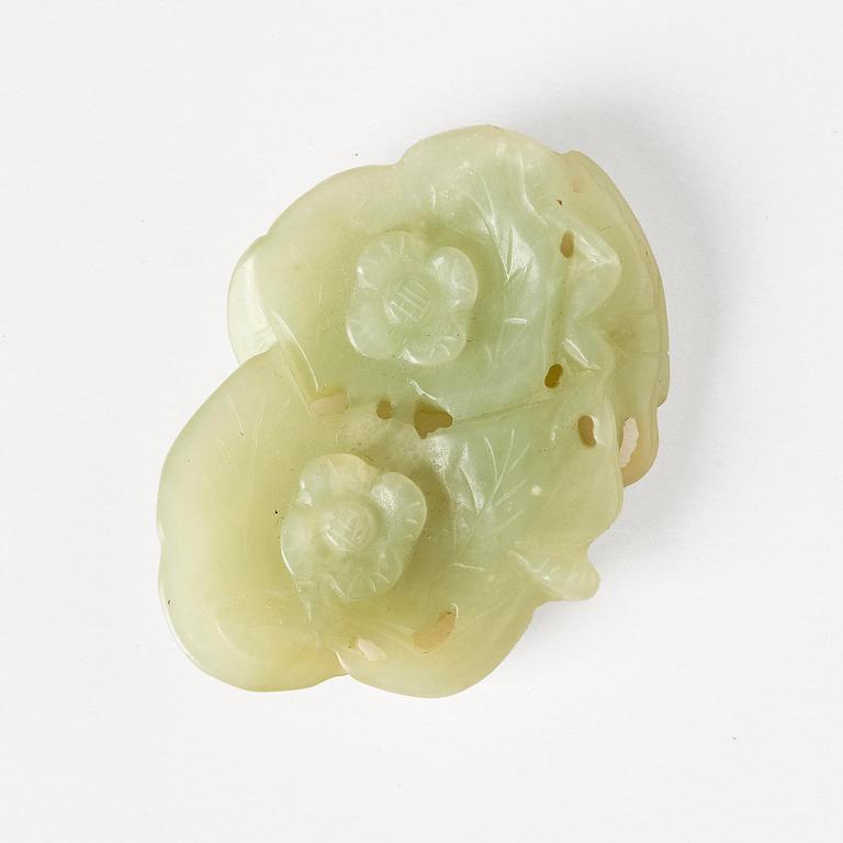 Two archers rings and two nephrite carvings.