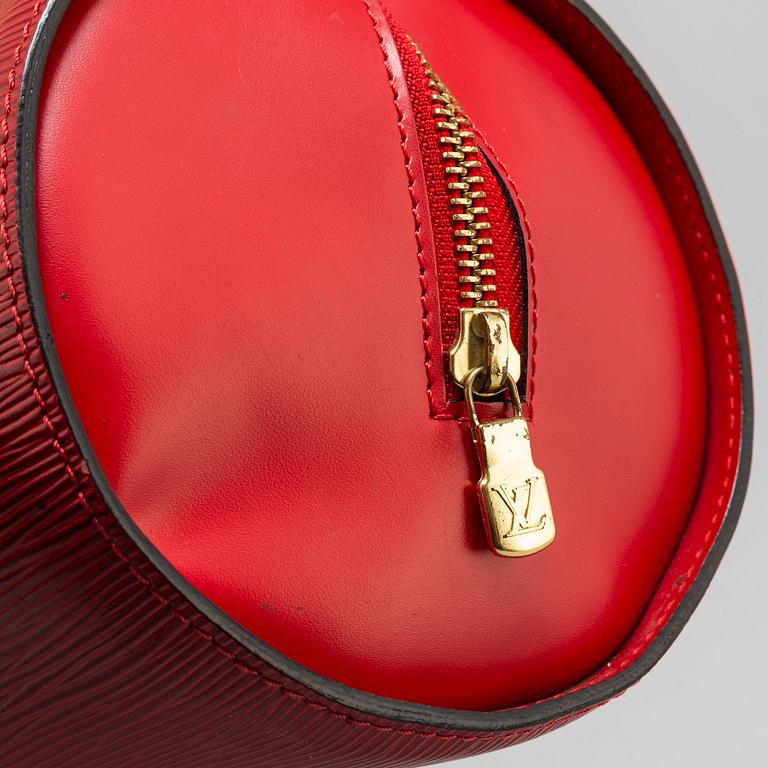 LOUIS VUITTON,  a red 'Epi Soufflot' bag.