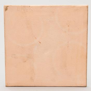 A stoneware relief signed BRYK.