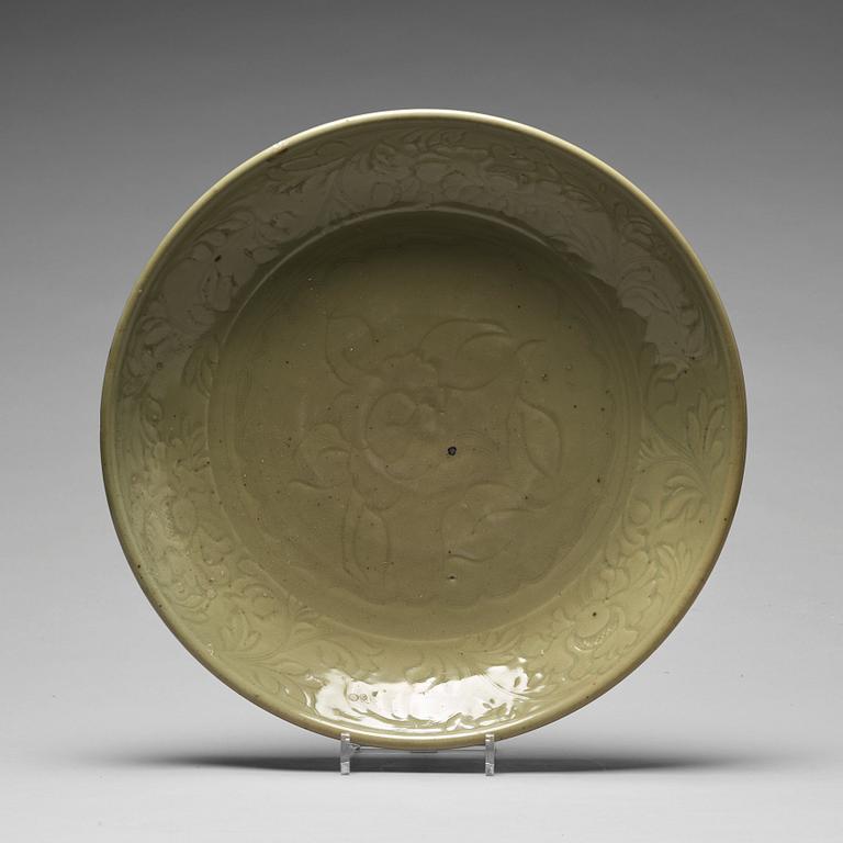 A large celadon glazed dish, Ming dynasty (1368-1644).