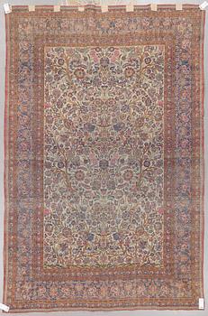 A carpet, a semi-antique silk Kashan, ca 317 x 207-210,5 cm.