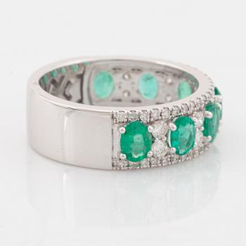 Emerald and brilliant cut diamond ring.