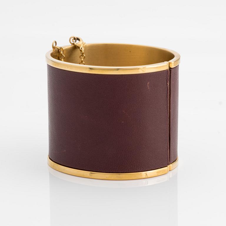 Céline, bangle, gold-tone metal and leather.