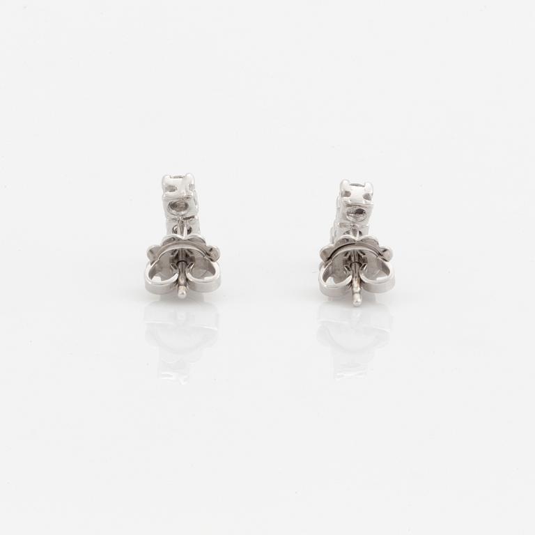 Brilliant-cut diamond earrings.