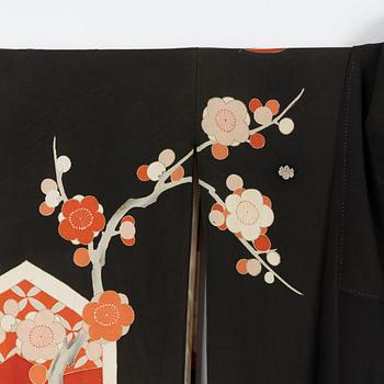 A painted and embroidered silk kimono. Japan, 20th century.