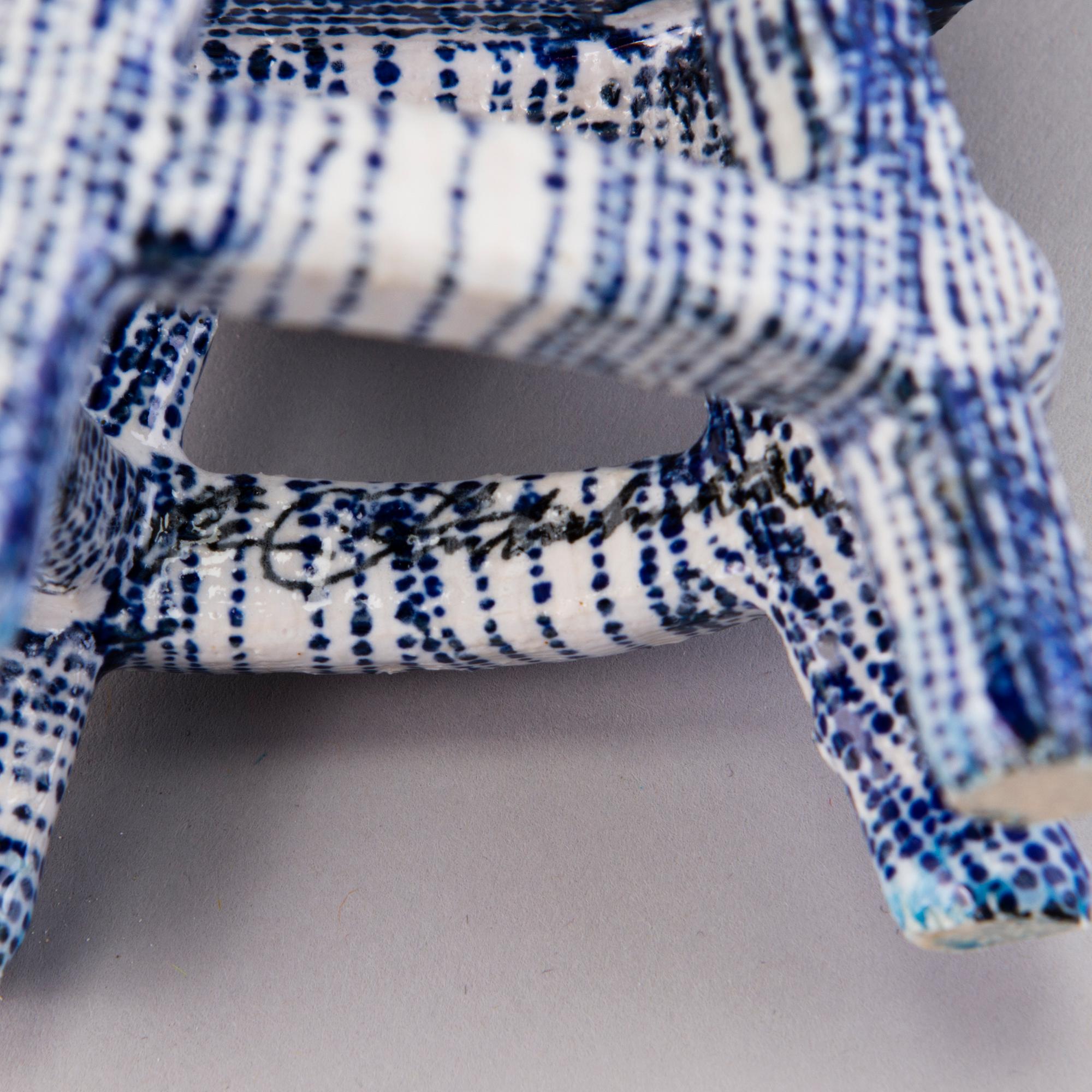 HEINI RIITAHUHTA, a porcelain miniature sculpture 'Chair' signed Heini Riitahuhta.