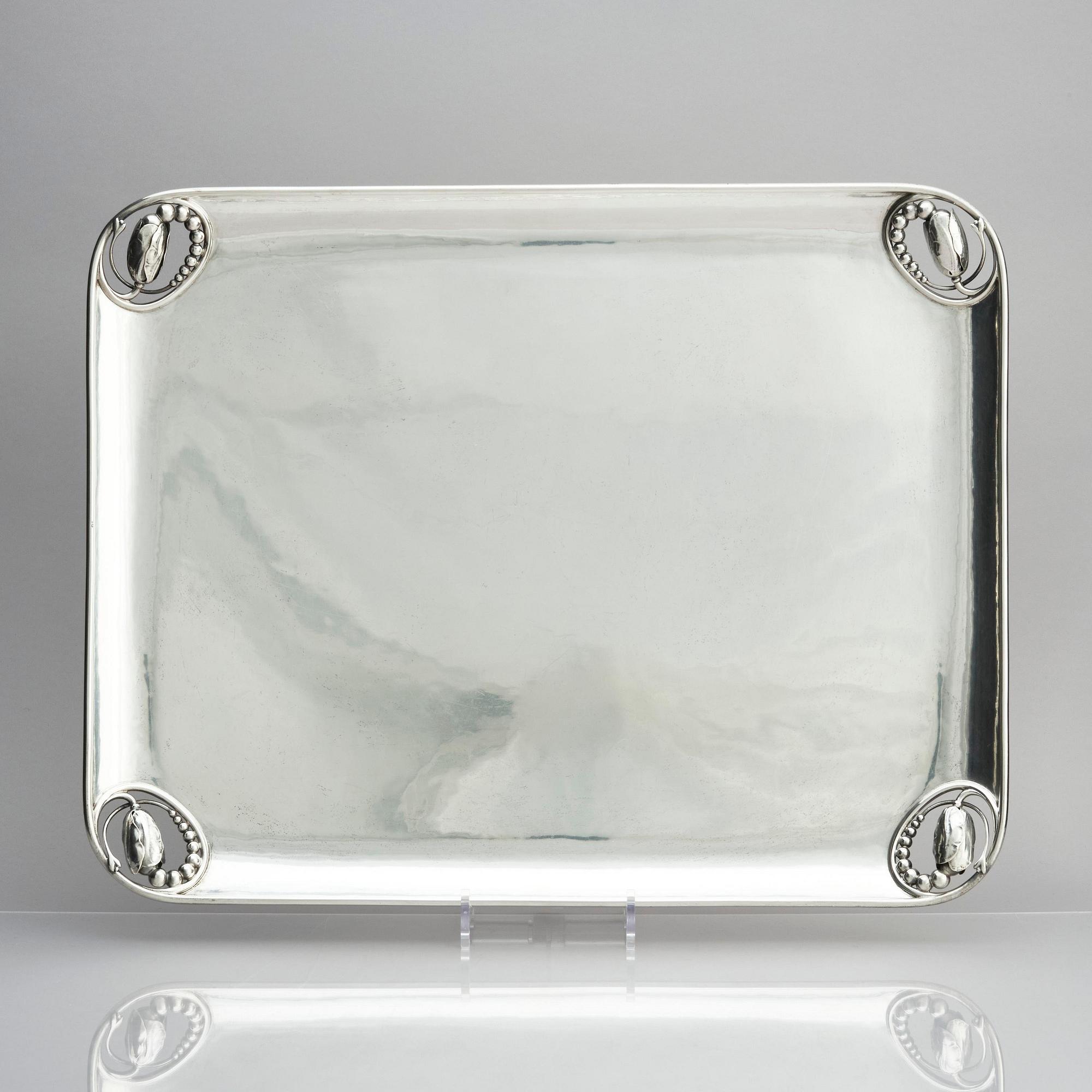Georg Jensen, a Magnolia/Blossom tray, design nr 2, executed in Copenhagen 1919, 830/1000 silver.
