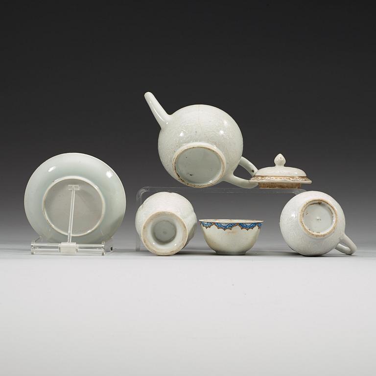 A seven piece underglaze blue, gold and bianco sopra bianco tea service, Qing dynasty, Qianlong (1736-95).