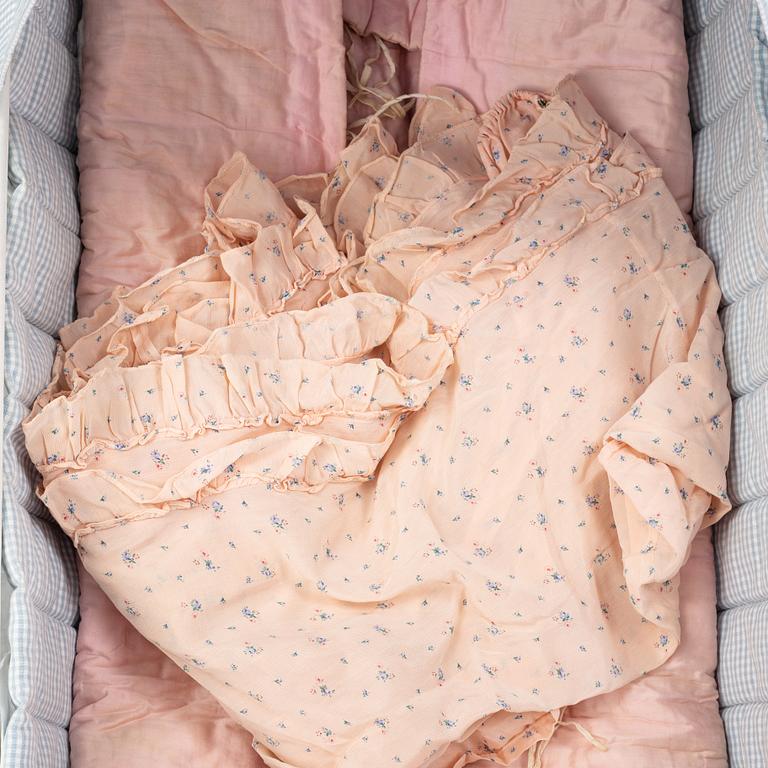 A children's or toddler's crib, the first half of the 20th century.