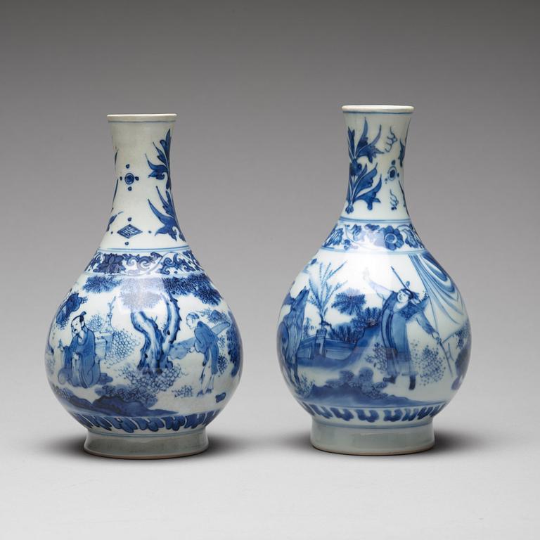 Two Transitional blue and white pear shaped vases, 17th Century.