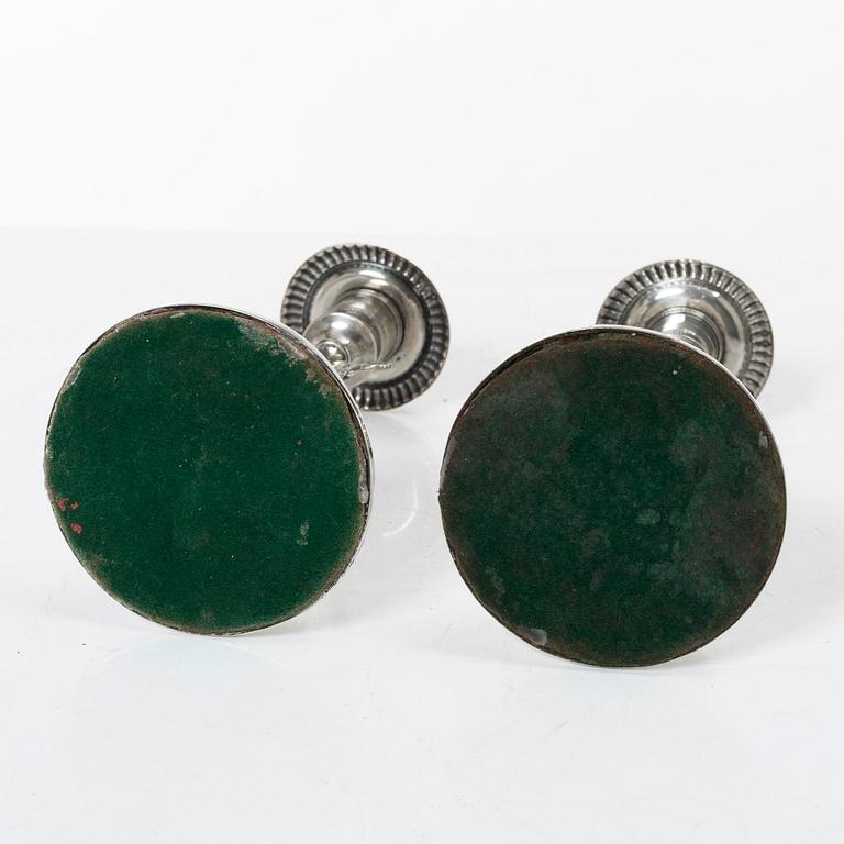 Empire, A pair of Swedish silver candlesticks, mark of Otto Wilhelm Kjellberg,  Västerås 1838.