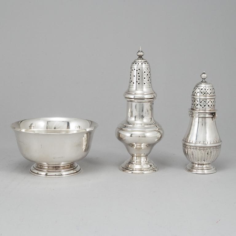 Two silver sugar casters and a silver bowl. Late 19th and 20th century.