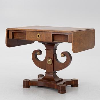 An Empire table, first half of the 19th century.