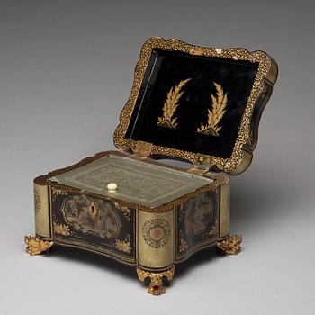 A Canton lacquer tea box with a pewter liner, Qing dynasty, 19th Century.