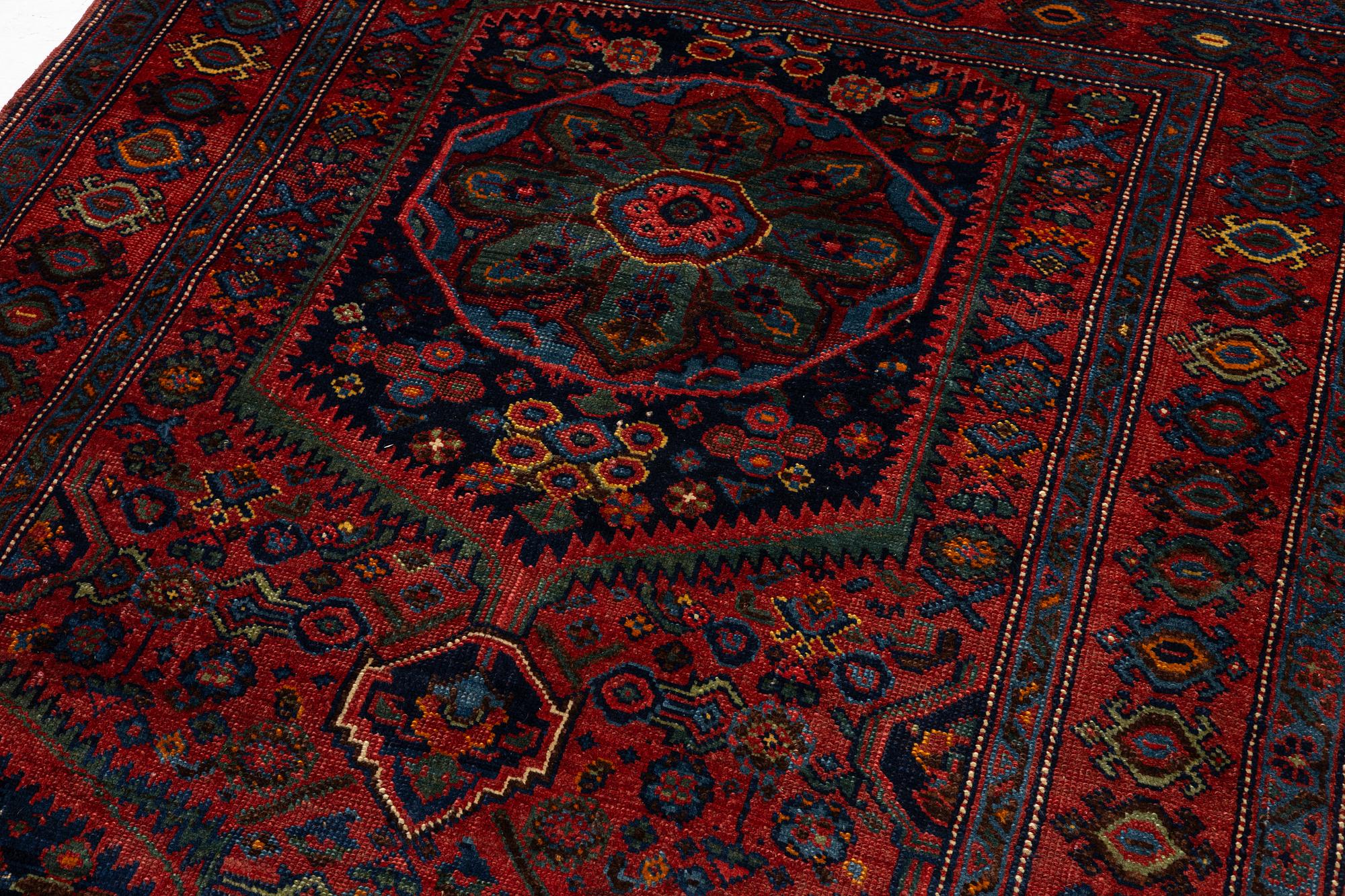An antique Northwest Persian rug, c. 179 x 143 cm.