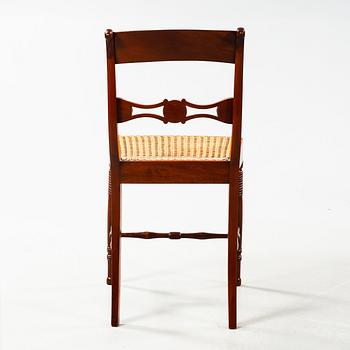 Nine chairs, made by Nils Tohrsson in Lindome (1779 - 1848) in the first half of the 19th century.