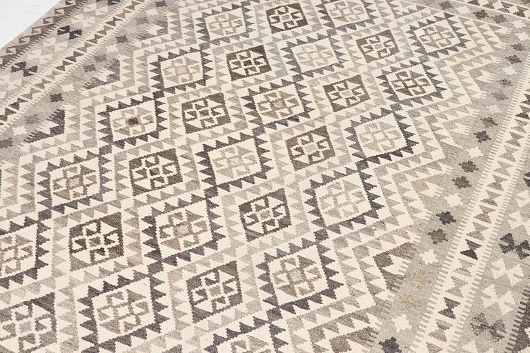 A Kelim carpet, a. 295 x 200 cm.